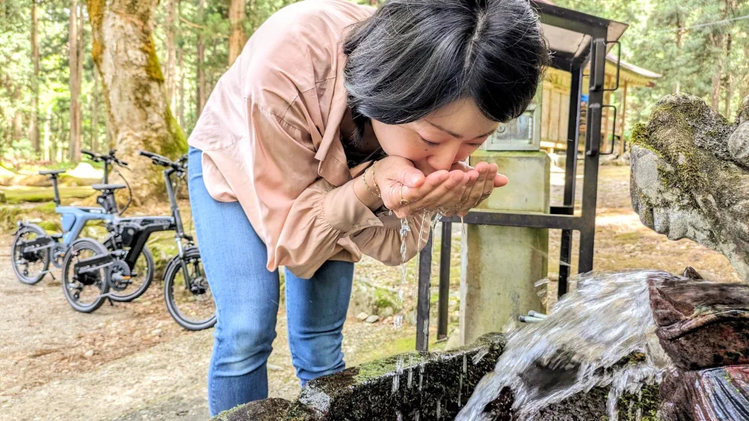 Enjoying the delicious natural spring water.