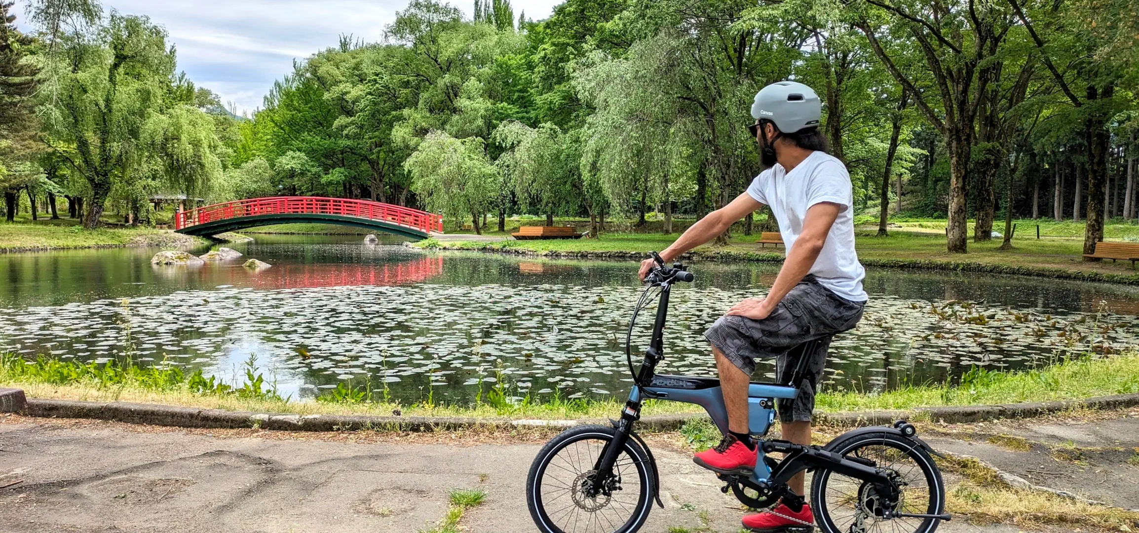 Happy cyclists enjoying the view of a beautiful park in Yuzawa, Niigata.